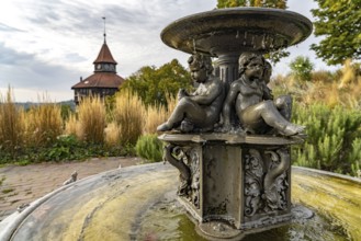 Castle fountain and the thick tower of the castle town fortifications in Esslingen am Neckar,