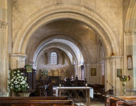 Norman chancel architecture inside church of Saint John the Baptist, Devizes, Wiltshire, England,