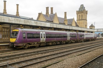 EMR Regional Class 170 train at Lincoln railway station, city of Lincoln, Lincolnshire, England, UK