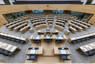 State parliament of Baden-Württemberg. Empty plenary hall, state coat of arms. Stuttgart,