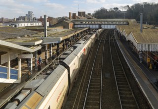 Looking down from above at Greater Anglia train at platforms of Ipswich railway station, Suffolk,