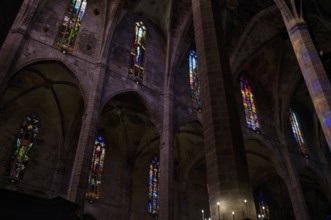 Colourful church windows, interior view, La Seu, Basilica de Santa Maria, Cathedral of Saint Mary,