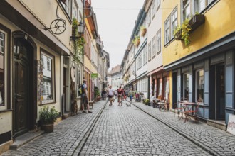 Everyday scene on the Krämerbrücke in the historic city centre of Erfurt, Thuringia, Germany, for