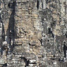 Giant stone-carved face of the Bodhisattva Lokeshvara, also known as Avalokiteshvara, Bayon Temple,