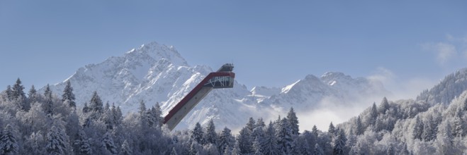 Mountain panorama over the Freibergsee in winter, near Oberstdorf, behind the Heini-Klopfer ski