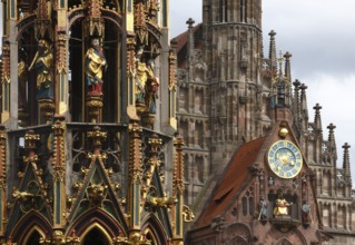 Beautiful fountain built 1389 - 1396 by Parlier and stonemason Heinrich Beheim, church built under