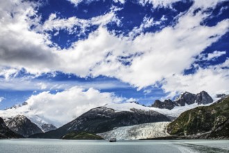 Cruise ship Stella Australis anchored in front of Pia Glacier, Cordillera Darwin, north-east