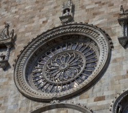 Italy Como Cathedral west façade rose window of the late 15th century, St., Saint, Saint