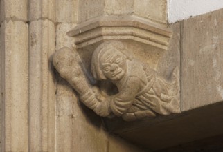 Historic pension chamber, console above the entrance, man with truncheon