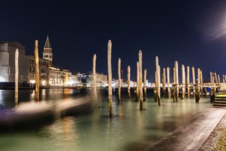 Venetian gondolas, boat dock at the customs office on the Grand Canal, Gondola Traghetto Dogana,