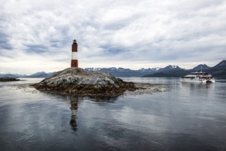 Lighthouse Les Eclaireurs with excursion boat, Beagle Channel, Ushuaia, Argentina, South America