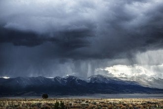 Wild thunderstorm and rain clouds over the Great Basin Highway US 93, between Ely and Baker,