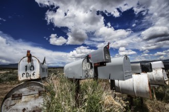 Letterboxes, mailboxes, cumulus clouds Highway 50, Loneliest Road in America, Ely, Nevada, USA,