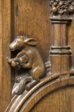 Choir stalls, drolleries on the stall sides with proverbial depictions, 1493 by Johannes Gruter