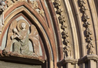 West portal, tympanum with angel, St., Sankt, Saint