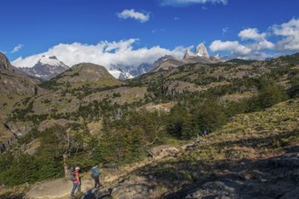 Trekkers at Cascada Martin with a view of the Fitzroy Massif, El Chaltén, Los Glaciares National