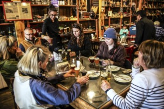 Craft beer tasting at Ramos Generales el Almacen, harbour of Ushuaia, Argentina, South America