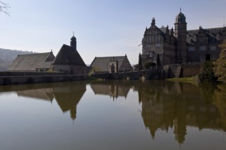 Hämelschenburg b Hameln Castle of the Klencke family 75132 left Castle church 1563 centre Barn in