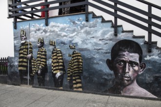 Mural with convicts from the historic Presidio prison in Ushuaia, Argentina, South America