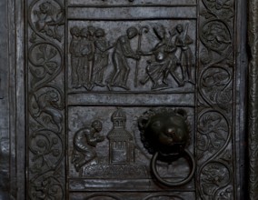 Bronze door from around 1175, top: St Adalbert receiving the crosier, bottom: Prayer at the tomb of