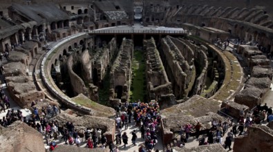 Interior with wall remains below the former arena