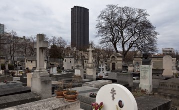 Cemetery, behind the Tour Montparnasse tower block, 210 metres high, 1969-73 by Roger Saubot