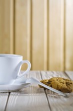 Ceramic coffee cup and cookies