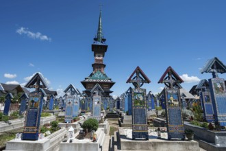 SAPANTA, ROMANIA - JUNE 24, 2024: Graves at famoues merry cemetery