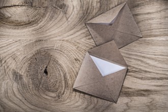 Aged post envelopes letters on wooden board