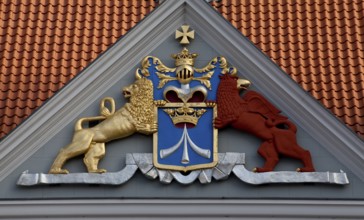 Former Swedish commandant's office, city coat of arms accompanied by griffin and lion