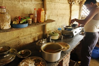 Man cooking vegetable noodles, wayside Dhaba, Lumbini, Nepal, Asia