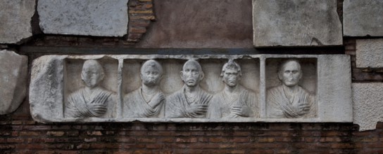 Ancient family tomb of Hilarius Fuscus, portrait reliefs