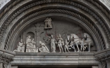 Italy Como Cathedral 88758 Started in 1396 Continued until the 16th century Tympanum of the main