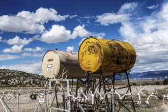 Truck stop with oil barrels and a fence of deer antlers, Highway 50, Loneliest Road in America,