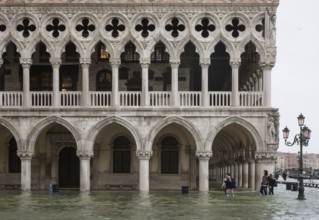 Venice, Doge's Palace (Palazzo Ducale), arcaded storeys of the west façade, detail at high tide