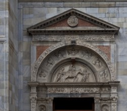 Italy Como Cathedral Gabled south portal c. 1500 by Jacopo and Tommaso Rodari in the tympanum