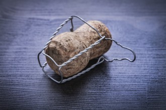 Close up view on corck of champagne with wire