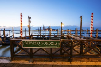 Morning atmosphere in front of sunrise, gondolas, Servizio Gondola, church of San Giorgio Maggiore