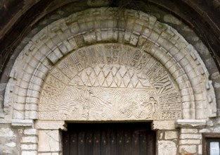 Portrait, Saint-Martin church from the 10th century (?) West portal, tympanum with labyrinth and