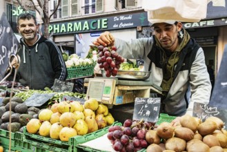 People selling fruit and vegetables, market in Noailles, Marseille