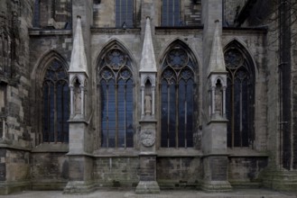 North façade of the three western nave bays with buttressed canopies restored in 2011, St., Sankt,