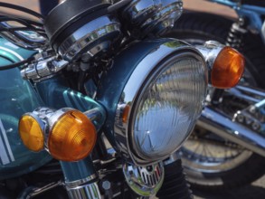 Blue retro motorbike with chrome headlight and orange indicators, Appelhülsen, münsterland, germany