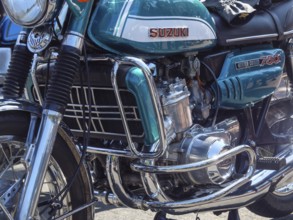 Retro Suzuki motorbike with water-cooled engine and turquoise-coloured accents, Appelhülsen,