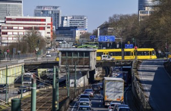 Motorway A40, Ruhr expressway, heavy traffic jam, rush hour, city passage in Essen, skyline of the