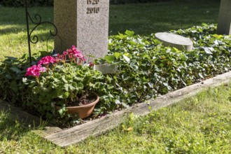 Wooden historical graves for urns at the Alleestraße cemetery in Riesa, Saxony, Germany, Europe