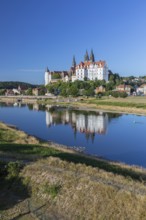 Albrechtsburg Castle and cathedral towers with reflection in the Elbe, Meissen, Saxony, Germany,