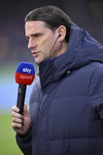 Coach Gerardo Seoane Borussia Mönchengladbach BMG Portrait in interview Microphone Microphone Logo