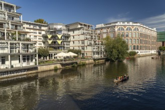 Elster Lofts residential building and the Weiße Elster river in Leipzig, Saxony, Germany, Europe