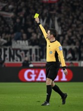 Referee Referee Benjamin Brand shows yellow card yellow caution MHPArena, MHP Arena Stuttgart,