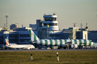 Condor aircraft on the taxiway, apron of Düsseldorf International Airport, old air traffic control